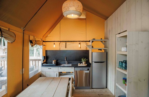 Loenen House | Stay in the adventurous Ranger Lodge: for 8 guests with a play net, luxury kitchen, and covered terrace overlooking the playground.
