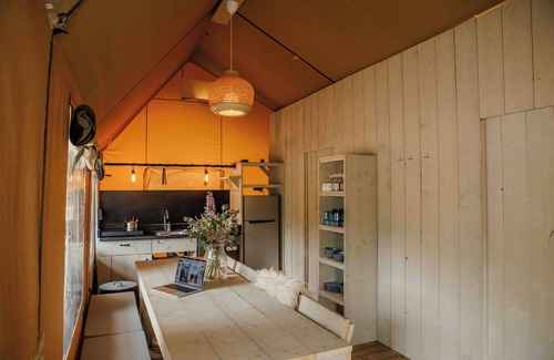 Loenen House | Stay in the adventurous Ranger Lodge: for 8 guests with a play net, luxury kitchen, and covered terrace overlooking the playground.