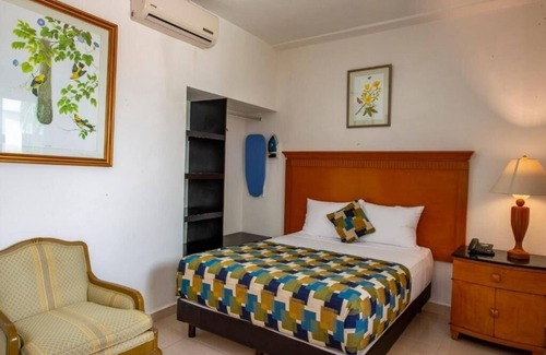 Centro Hotel | Stay in the Heart of Mérida with King Room, Pool, Patio & Terrace Views