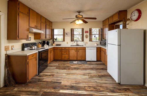 Dennis House | Experience a 350-Acre Cattle Ranch with River Tubing Fun!