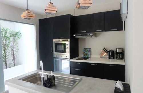 Khlong Tan Nuea House | Experience Unique Style at ENVY Home with Kitchen Access