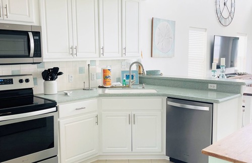 East End House | Stay Salty: Poolside Retreat with Bay Views & Golf Cart Access