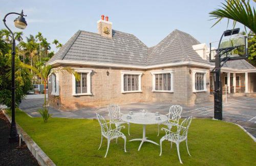 Kozhikode Villa | Unforgettable StayVista at The Stone Villa with Court & Pool