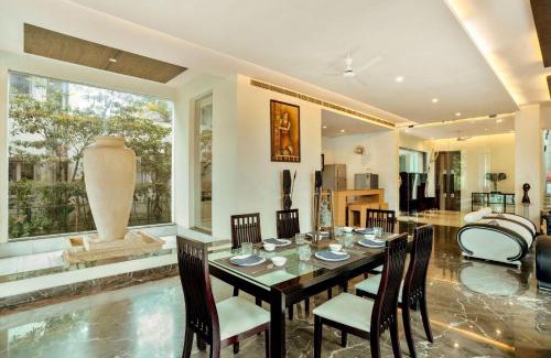 Howrah Villa | Elegant Poolside Villa with Lawn & Terrace - StayVista