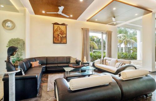 Howrah Villa | Elegant Poolside Villa with Lawn & Terrace - StayVista