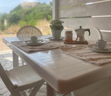 Aglientu Apartment | Oceanfront Escape at Stazzo NaracuMAR - Pet Friendly Stay