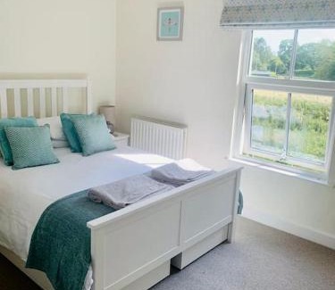Newby Bridge House | Cozy Steam Train Cottage - A Lake District Retreat
