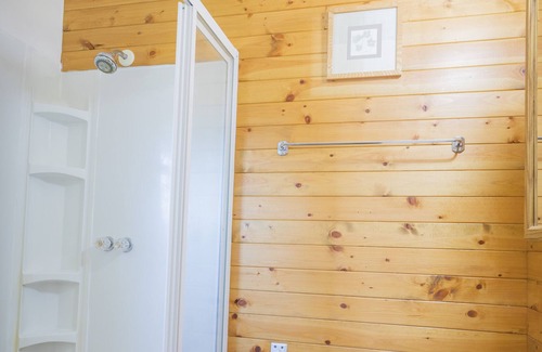Walker Cabin | Romantic Oceanfront Retreat at Steamboat Bay Resort Cabin 6