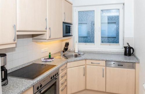 Duhnen Apartment | Oceanfront Steinmarner Stadtvilla with Child-Friendly Perks