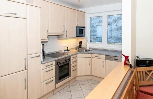Duhnen Apartment | Oceanfront Steinmarner Stadtvilla with Child-Friendly Perks