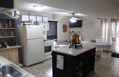 Eudora House | Step Back In Time to a charming 2-bedroom lower level house in adorable Eudora