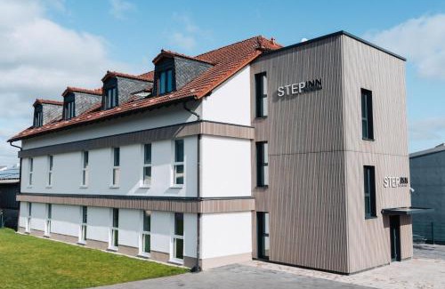 Rosbach vor der Hoehe Hotel | Discover STEP INN The Fair Hotel: Pet-Friendly Retreat