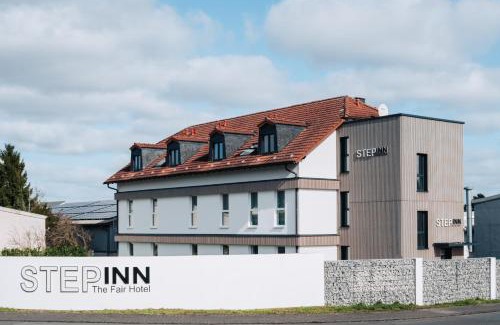 Rosbach vor der Hoehe Hotel | Discover STEP INN The Fair Hotel: Pet-Friendly Retreat