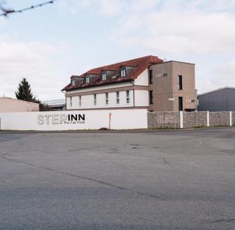 Rosbach vor der Hoehe Hotel | Discover STEP INN The Fair Hotel: Pet-Friendly Retreat