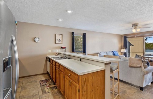Osage Beach Condo | Lakefront Escape: Poolside Bliss with Endless Sunset Views
