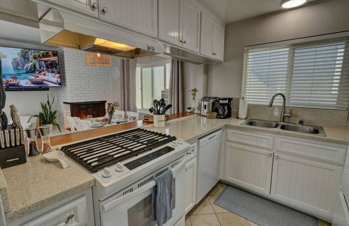West Newport Apartment | Steps to Sand w/Patio & Fireplace