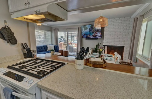West Newport Apartment | Steps to Sand w/Patio & Fireplace
