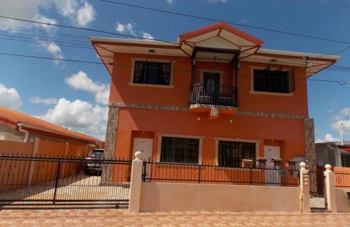 Trincity Apartment | Stewart Apt: Ideal for Families with Office & WiFi Access