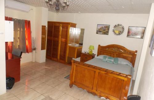 Trincity Apartment | Stewart Apt: Ideal for Families with Office & WiFi Access