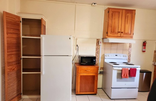 Trincity Apartment | Top-Rated Stewart Guest House with Kitchen & Spa Amenities