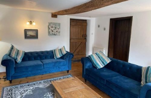 Stibb House | Discover Stibb Farm Cottage at Sandymouth - 4-Star Retreat