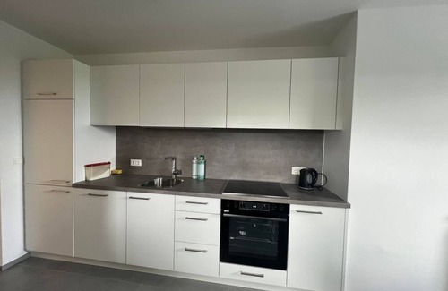 Sankt Martin im Muehlkreis Apartment | Cozy Studio at Stiglechner Tankstelle with Family-Friendly Perks
