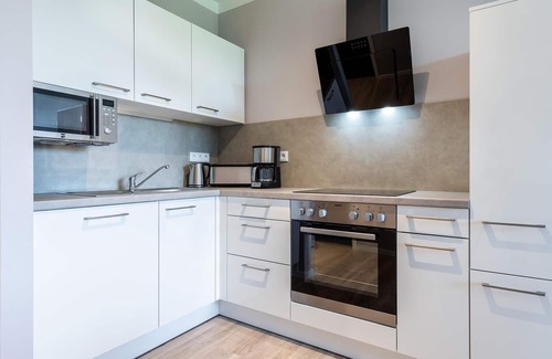 Alt-Travemunde/Ronnau Apartment | Elegant Apartment with Park View and Private Spa Retreat