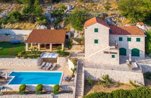 Slivno House | Unforgettable Oceanfront Retreat at Stolovi by Interhome