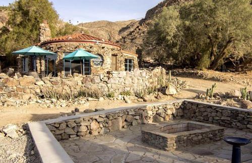 Araby Cove House | Stone-Built Bungalow Rental with Coachella Valley Views near Palm Springs, California