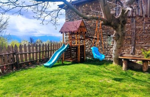 Garmen House | Cozy Stone House: Pet-Friendly Retreat with Fireplace