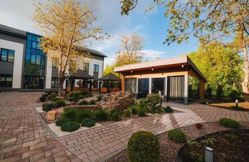 Kostopil Hotel | Budget-Friendly Stone Resort with Pet-Friendly Amenities