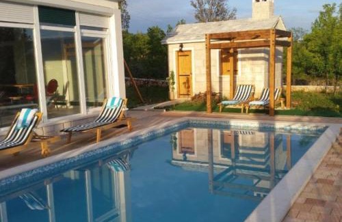 Cista Provo Villa | Elegant Stone Villa Bosnic: Oceanfront Retreat with Pool