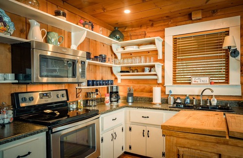 Hendersonville Cabin | Romantic Stoneledge Cabin with Hot Tub & Creekside Charm