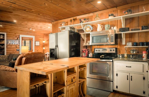 Hendersonville Cabin | Romantic Stoneledge Cabin with Hot Tub & Creekside Charm