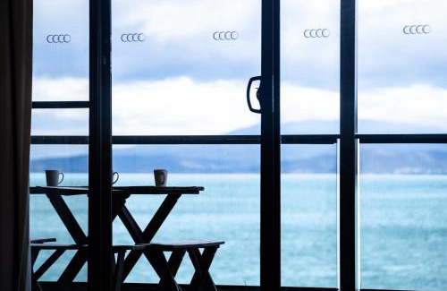 Primrose Sands House | Discover Stones Throw: Oceanfront Escape with Hot Tub