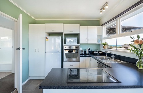 Ruby Bay House | Idyllic Stones Throw Beach House with Oceanfront Views