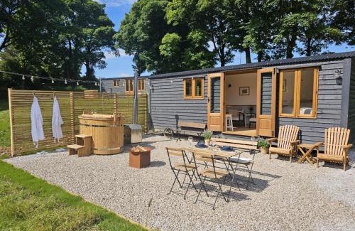 Lumbutts House | Inviting Stoodley View Shepherd Huts with Hot Tub Access