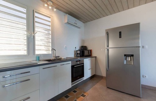 Petite-Ile Villa | Discover L'AMANDAVA: Ocean View & Private Heated Pool