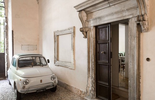 Verona City Centre Apartment | Historic Riverfront Palace with Private Garden & Pool