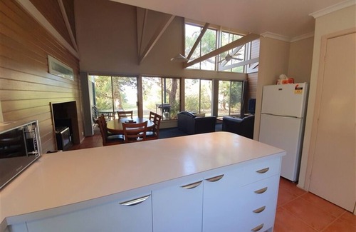 Forge Creek Apartment | Enchanting Stormbird: Waterfront Stay with Spa & Hot Tub
