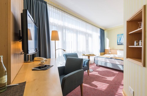 Warnemuende Hotel | Relax at Strand-Hotel Hübner: 4-Star Bliss Awaits