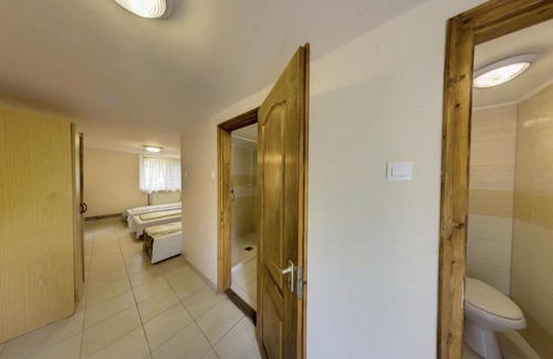 Dombrad Bed & Breakfast | Discover Strand Motel: Beachfront Retreat with Kitchen & Pets