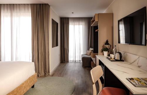 Gzira Hotel | Oceanfront Strand Suites by NEU Collective - Rated 8.7/10