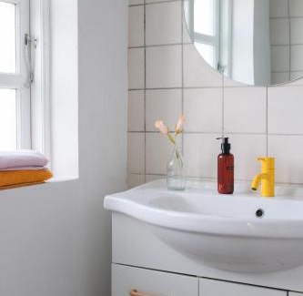 Fjand Badeby House | Discover Strandfogedgården: Pet-Friendly with Hot Tub Access