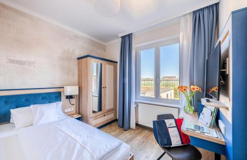 Reichenau Hotel | Beachfront Bliss at Strandhotel Löchnerhaus - 4-Star Comfort
