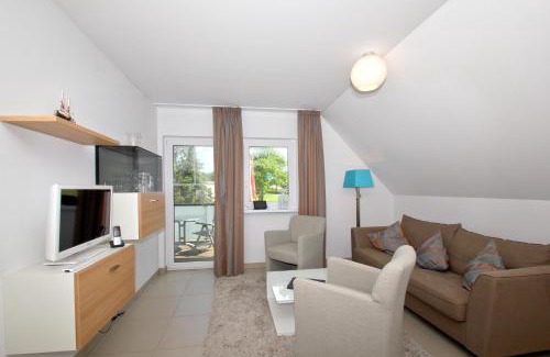 Lobbe Apartment | Seaside Retreat with Balcony & Free AHOI Waterpark Access