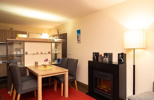 Wremen Apartment | Cozy Oceanfront Retreat with Sauna and Balcony Views