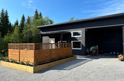 Luoto Ski Chalet | Lakefront StrandRo Retreat with Private Beach & Ocean View