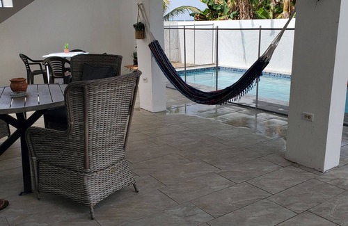 Herreras House | Relaxing Strawberry Beach Apartment with Private Pool Access