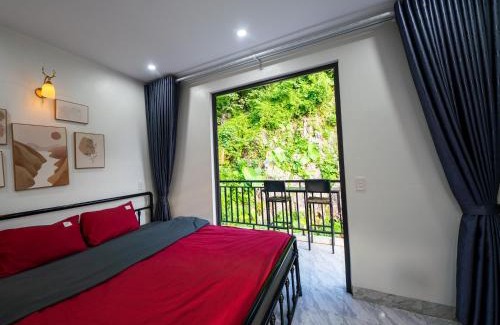 Ha Giang Bed & Breakfast | Inviting Strawberry House: Oceanfront Stay & Bike Rentals